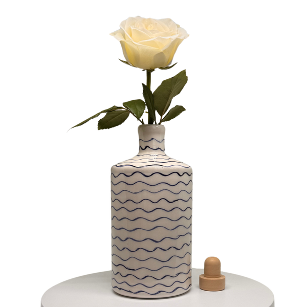 Artisan Crafted Wavy Bottle And Vessel